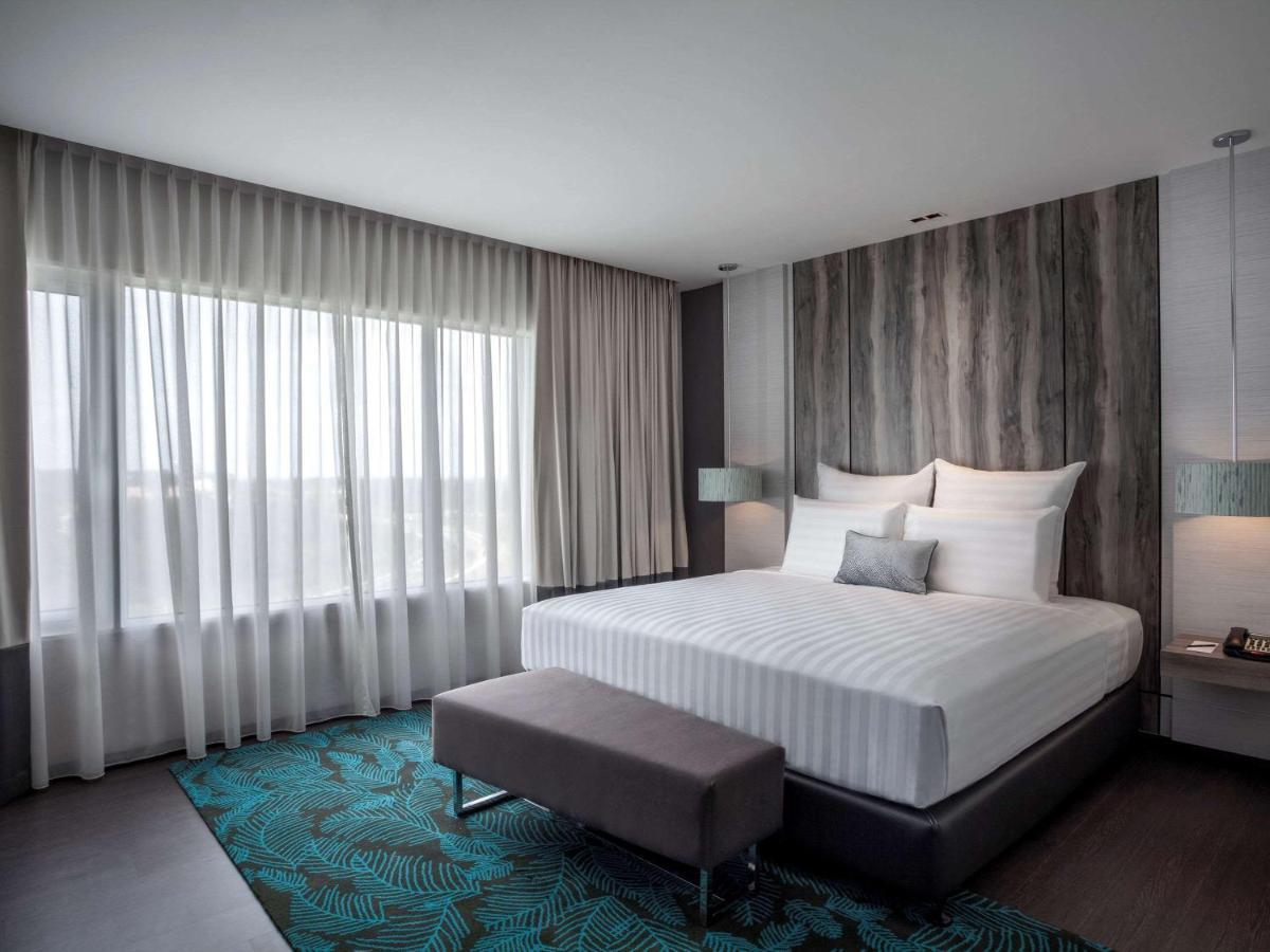 فندق بولمان ميري واترفرونت المظهر الخارجي الصورة A bedroom at the hotel